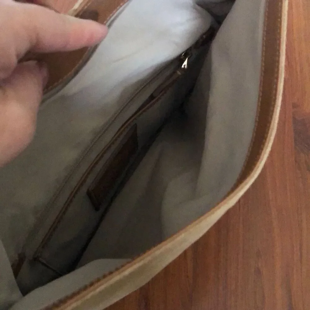 Tumi Suede and leather beige tan clutch handbag